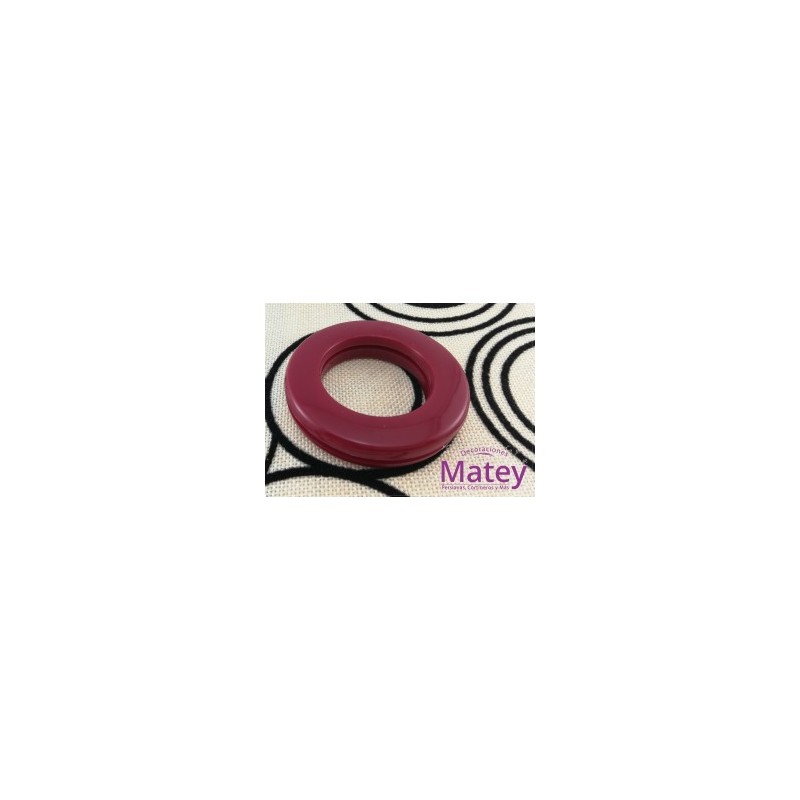 OJILLO PLASTICO CHICO VINO BRILLANTE, INTERIOR 38 MM EXTERIOR 62 MM MARCA DM.