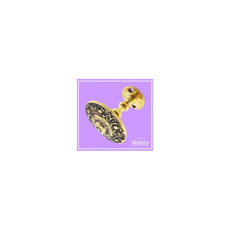 CHAPETÓN GRECAS PATINADO CON BASE CON TORNILLO EN BRONCE PULIDO.